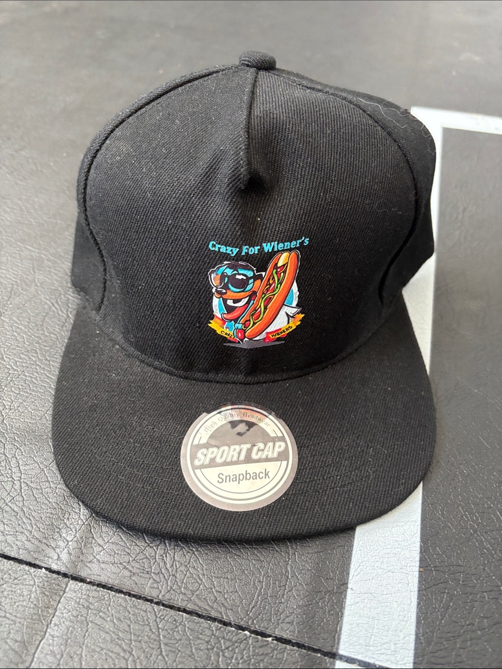 Black Snapback Hat with Hot Dog Graphic